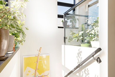 Inspiration for a small contemporary concrete u-shaped staircase remodel in Toronto