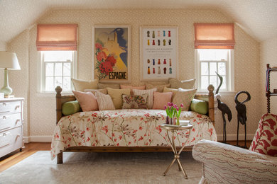 Mid-sized eclectic guest medium tone wood floor bedroom photo in DC Metro with beige walls