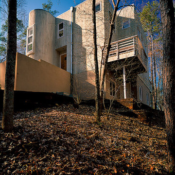 The cubist forms and cantilevered Dining Deck embrace the treetops