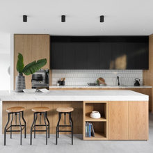 Example of Island Seating side with open shelves and cabinet with pop u