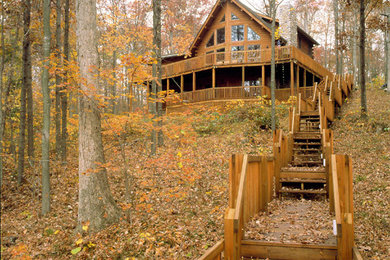 Rustic exterior home idea in Other