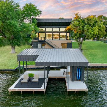 Modern Waterfront Home with Integrated Boat Dock and Elevated Living