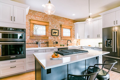 Example of an urban kitchen design in Denver