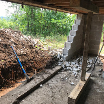 Failing foundation wall replacement and waterproofing