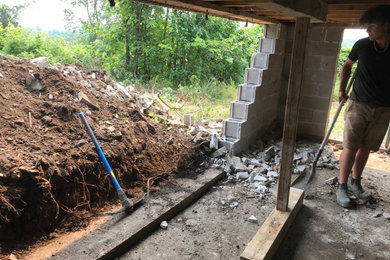 Failing foundation wall replacement and waterproofing
