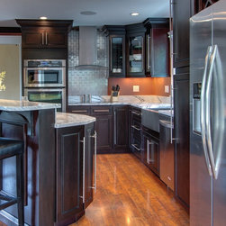 Espresso maple glass doors and oven cabinets - Kitchen Cabinetry
