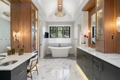 Example of a transitional bathroom design in Denver