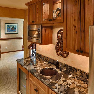 Rustic Lower Level Family Room With Kitchenette