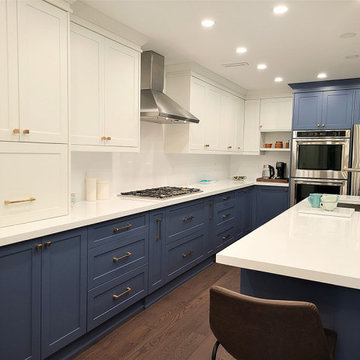 Two tone white and blue kitchen design.