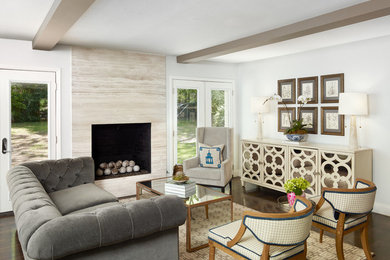Inspiration for a mid-sized transitional formal and enclosed dark wood floor and brown floor living room remodel in Dallas with gray walls, a standard fireplace, a stone fireplace and no tv