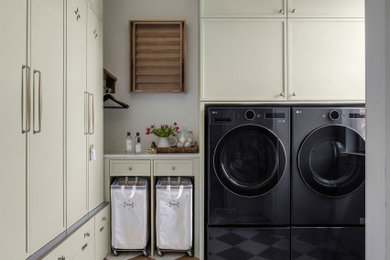Laundry room - transitional laundry room idea in Houston