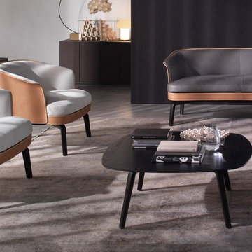 Nivola Sofa & Armchairs with Fiorile side table by Poltrona Frau