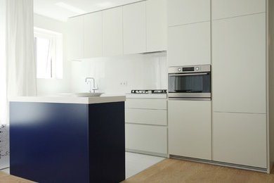 Mid-sized minimalist kitchen photo in Amsterdam