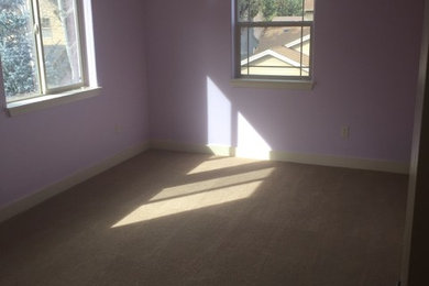 Bonus room turned into kids bedrooms and play area.