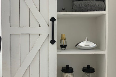 Bathroom - small farmhouse master bathroom idea in New York with a floating vanity