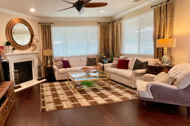 Inspiration for a mid-sized transitional open concept dark wood floor and brown floor living room remodel with a corner fireplace