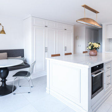 White Kitchen with Shaker Cabinets and Marble Benchtops