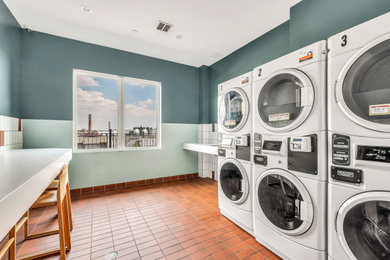 Minimalist laundry room photo in New York