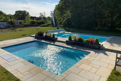 Inspiration for a mid-sized contemporary pool in Surrey.