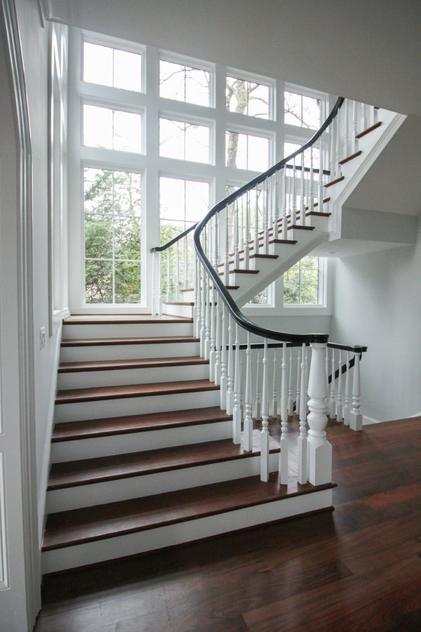 Powerful Impression by Floating Staircase in Suburban Foyer