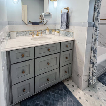 Blue and White Guest Bathroom with Gold Accents