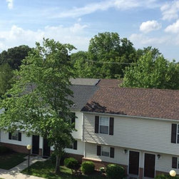 Old 3-Tab Shingle Removal on Entire Apartment Complex - Roofing And Gutters