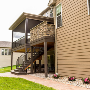 Screen Room Addition with Retractable Screens, Outdoor Kitchen, and Patio