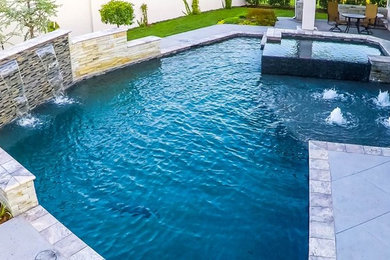 Example of a trendy courtyard custom-shaped hot tub design in Oklahoma City