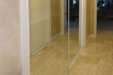 Before-after: glass doors to replace mirror doors.