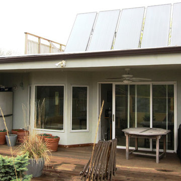 Tudor Style Home, Evanston, IL Hardie Stucco Siding + Metal Roof