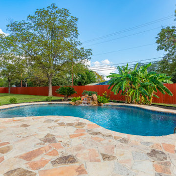 Freeform Pool with Stacked Boulder Waterfall in Castle Hills, TX