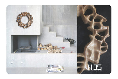 Large trendy concrete floor and gray floor family room photo with gray walls, a two-sided fireplace and a concrete fireplace
