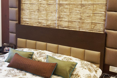 Example of a minimalist bedroom design in Kolkata