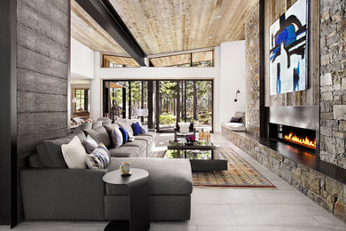This is an example of a contemporary open concept living room in Sacramento with grey walls, porcelain floors, a ribbon fireplace and a metal fireplace surround.