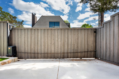 Example of a mid-sized minimalist exterior home design in Dallas