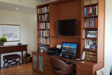 Example of a minimalist home office design in Other