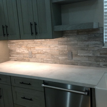 West Main Project - Heather Grey Shaker Cabinets, Marsala 8125 Quartz