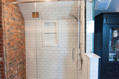 Bathroom - mid-sized contemporary master white tile and ceramic tile porcelain tile bathroom idea in Columbus with recessed-panel cabinets, black cabinets, gray walls, a drop-in sink and marble countertops