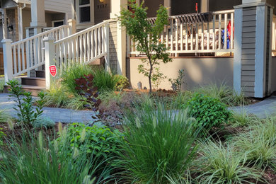 Design ideas for a small traditional drought-tolerant and partial sun front yard concrete paver walkway in Portland for summer.