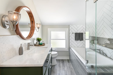 Example of a small trendy master white tile vinyl floor, brown floor and single-sink bathroom design in Milwaukee with shaker cabinets, green cabinets, a two-piece toilet, beige walls, an undermount sink, quartz countertops, a hinged shower door, white countertops and a built-in vanity