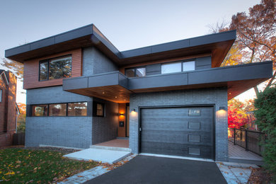 Example of a trendy exterior home design in Toronto