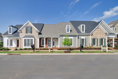 Inspiration for a large timeless one-story mixed siding exterior home remodel in DC Metro