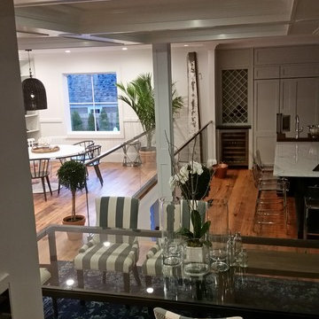 Glass hand rails in center of the rooms