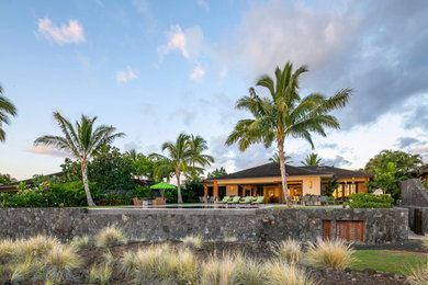 Example of an island style exterior home design in Orange County