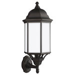 Sea Gull Lighting - Sea Gull Sevier Large 1Up Light Outdoor Wall Lantern, Bronze/Satin - The Sea Gull Collection Sevier one light outdoor wall fixture in antique bronze creates a warm and inviting welcome presentation for your home's exterior. The Sevier outdoor collection by Sea Gull Collection brings timeless design to new heights with its traditional design details found in classic outdoor fixtures as well as an open bottom for easy maintenance. Made of durable cast aluminum, a multi-level crown, top finial and stepped-edge back plate complete the traditional look. Offered in Antique Bronze or Black finish, both with Clear glass, the collection includes a one-light outdoor pendant, one-light post lantern, a large one-light up light outdoor wall lantern, a small one-light up light outdoor wall lantern, a small one-light downlight outdoor wall lantern, and a large one-light downlight outdoor wall lantern.