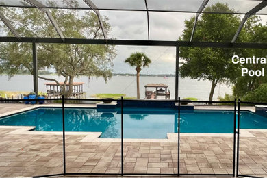 Example of a minimalist backyard brick pool design in Orlando