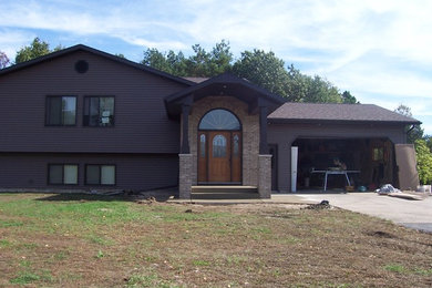 Example of a classic exterior home design in Other