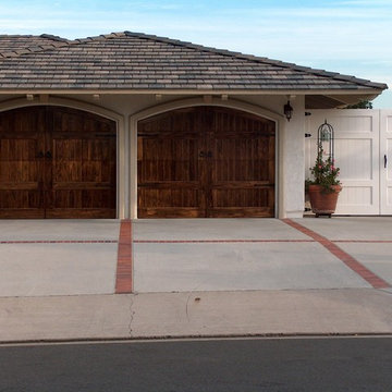 Arched Mahogony Stained Garage Doors