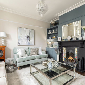 Calm & serene living room with a mix of chrome & brass metal accents