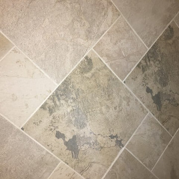 Bathtub replaced and new tile, vanity, floor.